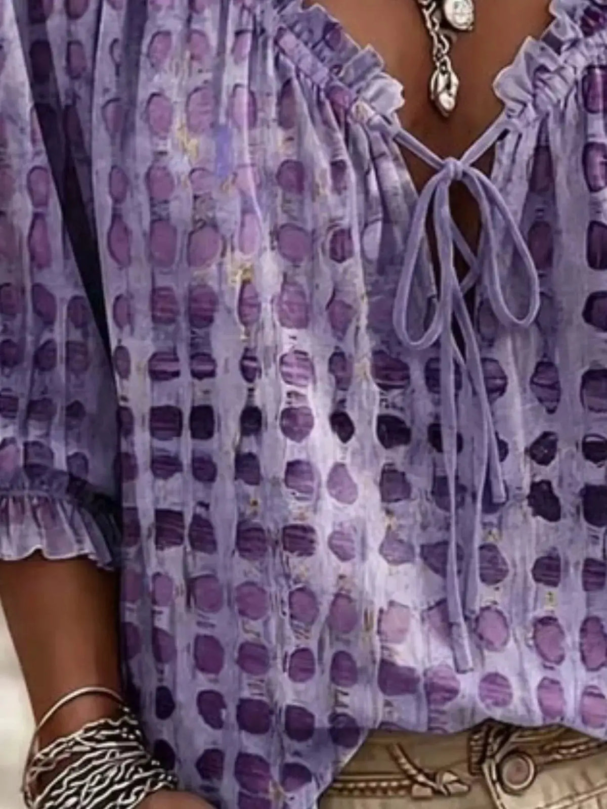 Plus-size tie-neck blouse with 3/4 sleeves in lavender circle-dotted pattern by Trendsi
