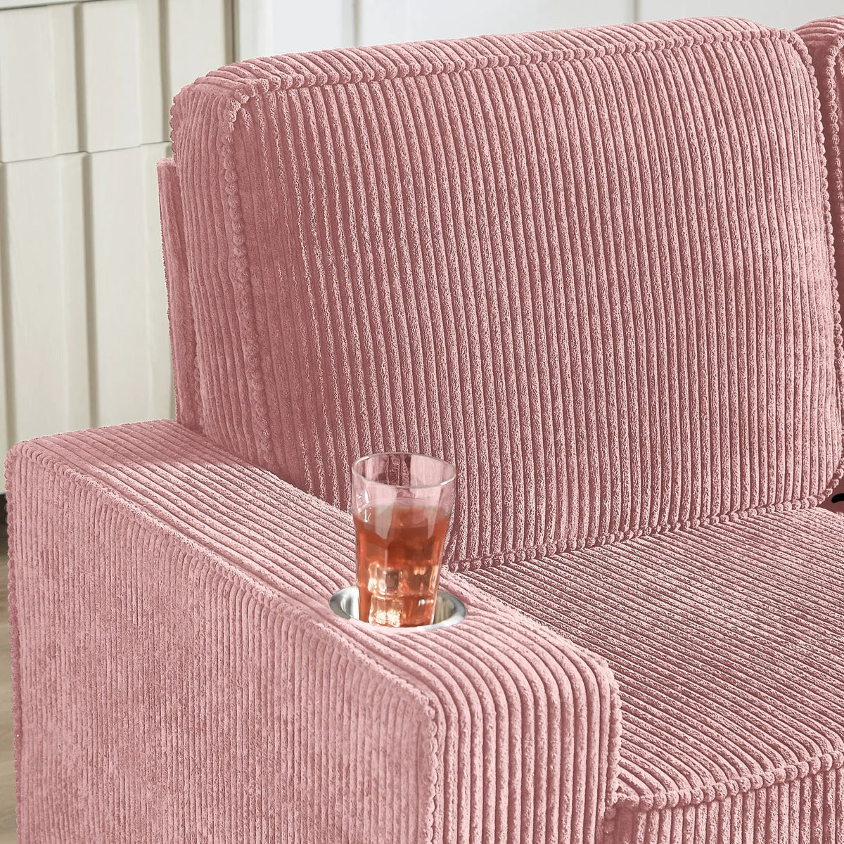 83.86 Corduroy Fabric Sofa in pink upholstery with ribbed texture.