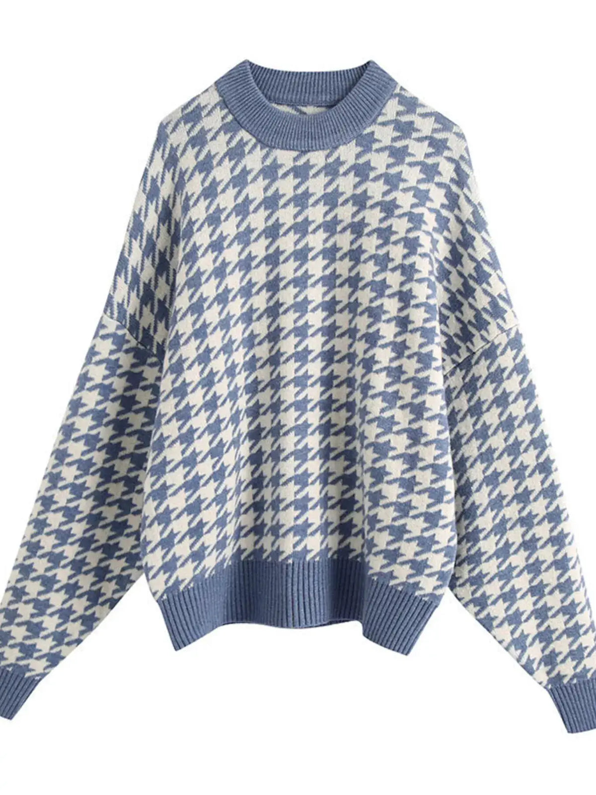 Oversized blue and white houndstooth sweater with ribbed crew neck, cuffs, and hem