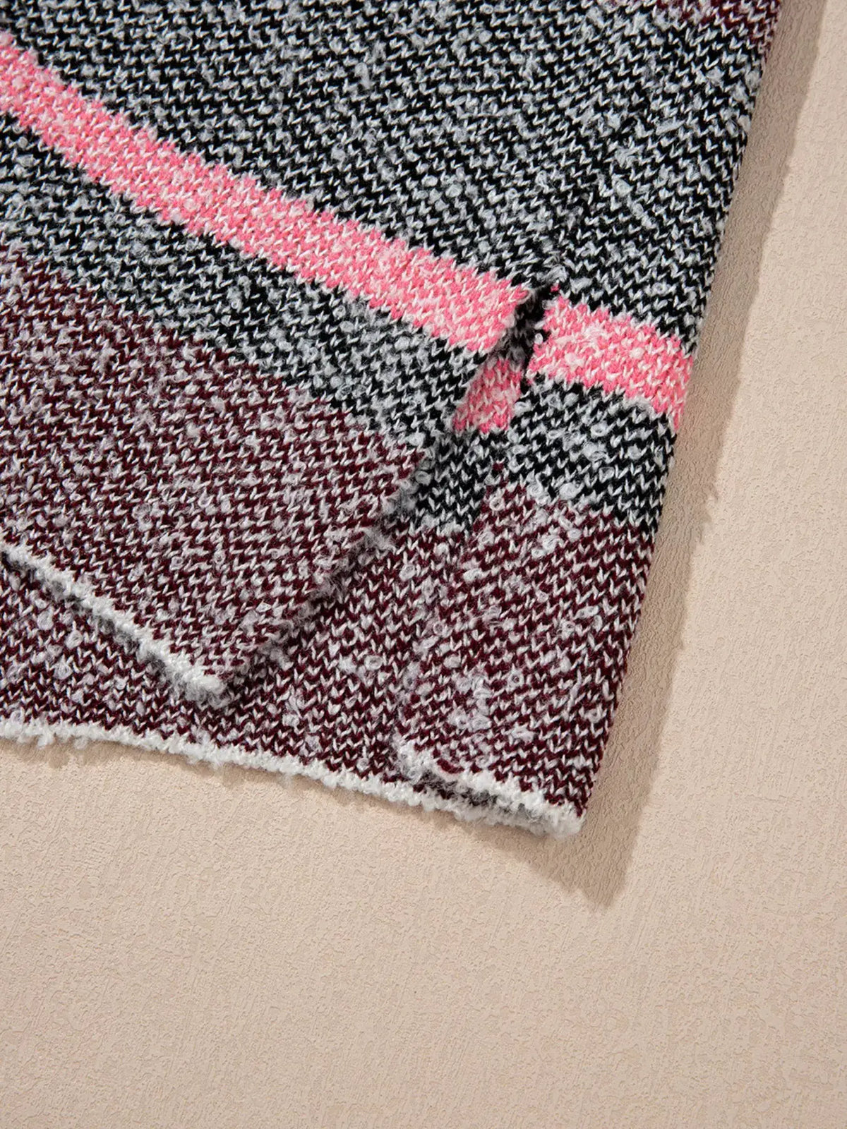 Cardigan by Trendsi; multi-color striped knit with pink accents, soft stretch fabric.