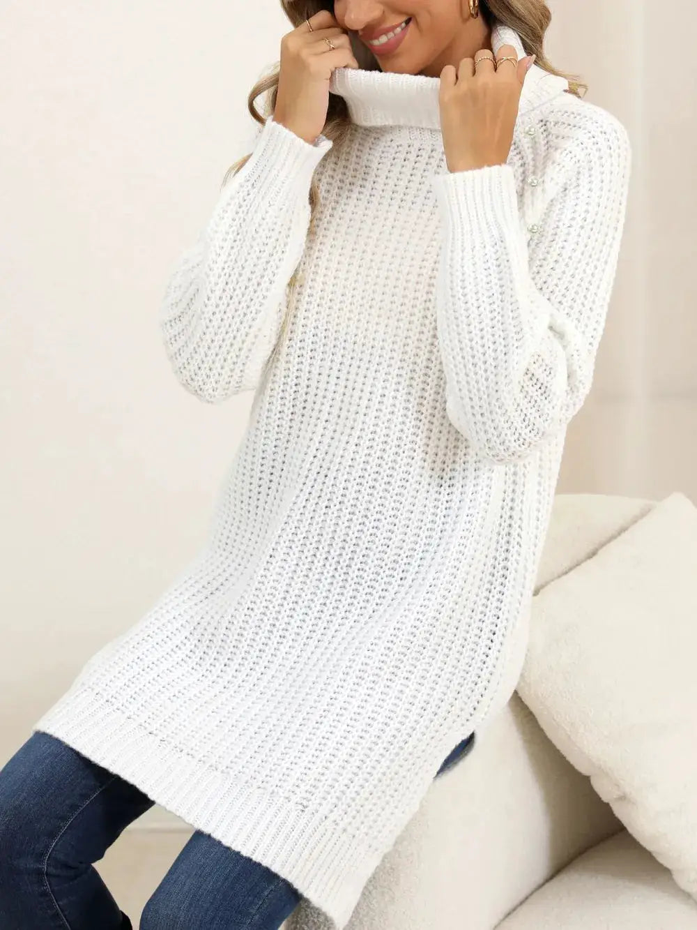 Womens white knit turtleneck pullover sweater with long sleeves and side slit by Trendsi