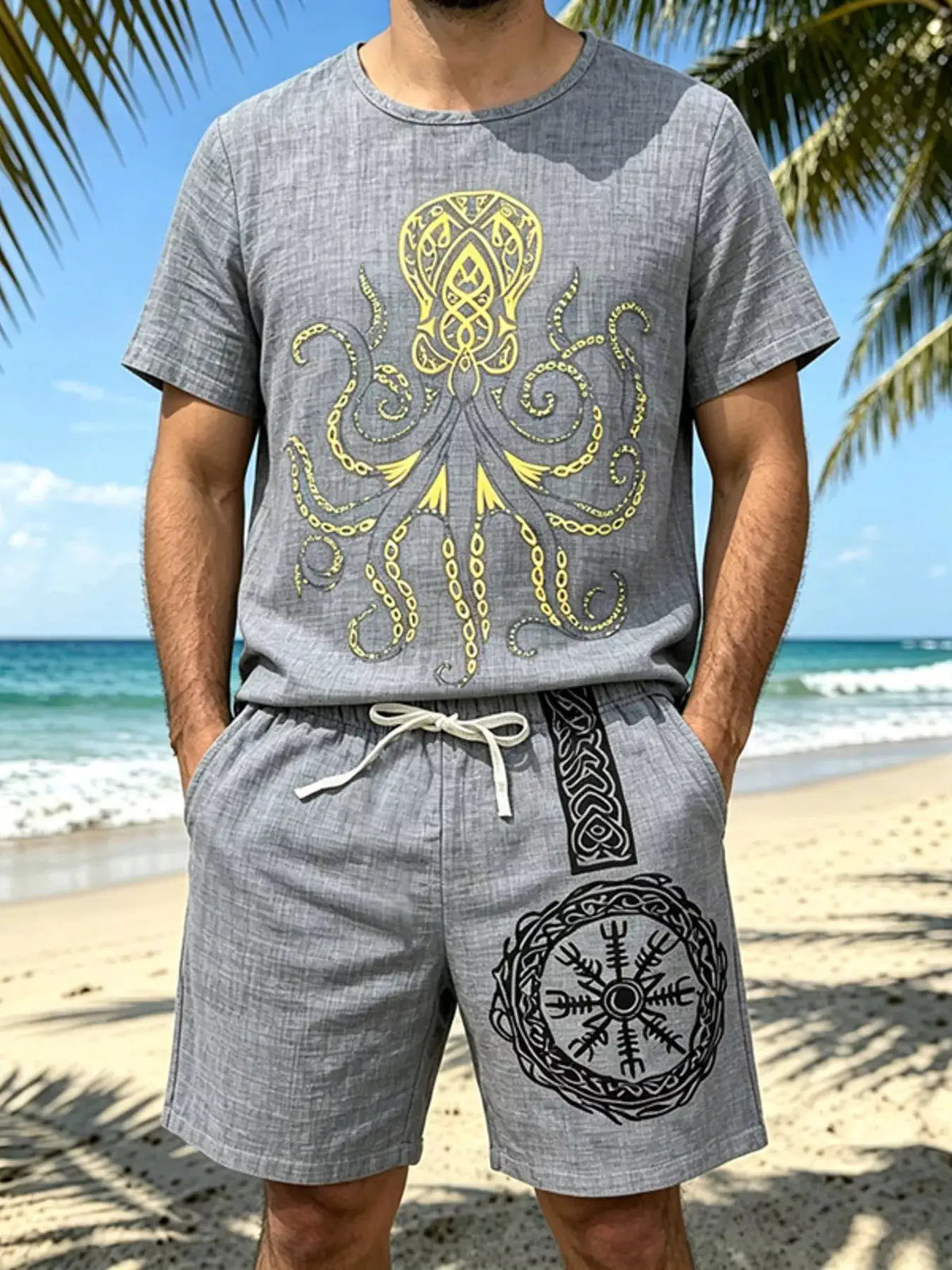 Mens grey two-piece loungewear set with yellow graphic print on tee and circular motif on shorts