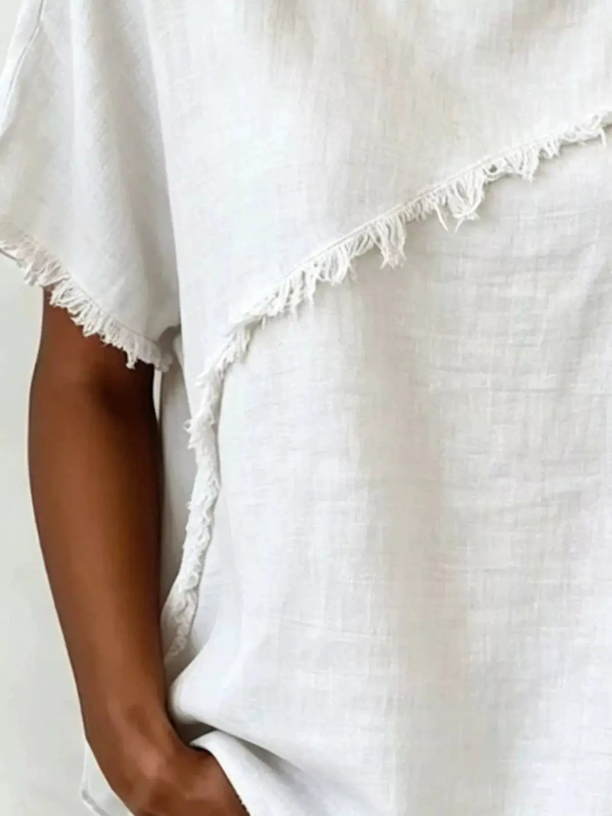 Full Size Frayed Hem Short Sleeve Top Plus Size by Trendsi, white linen-like fabric with fringe hem