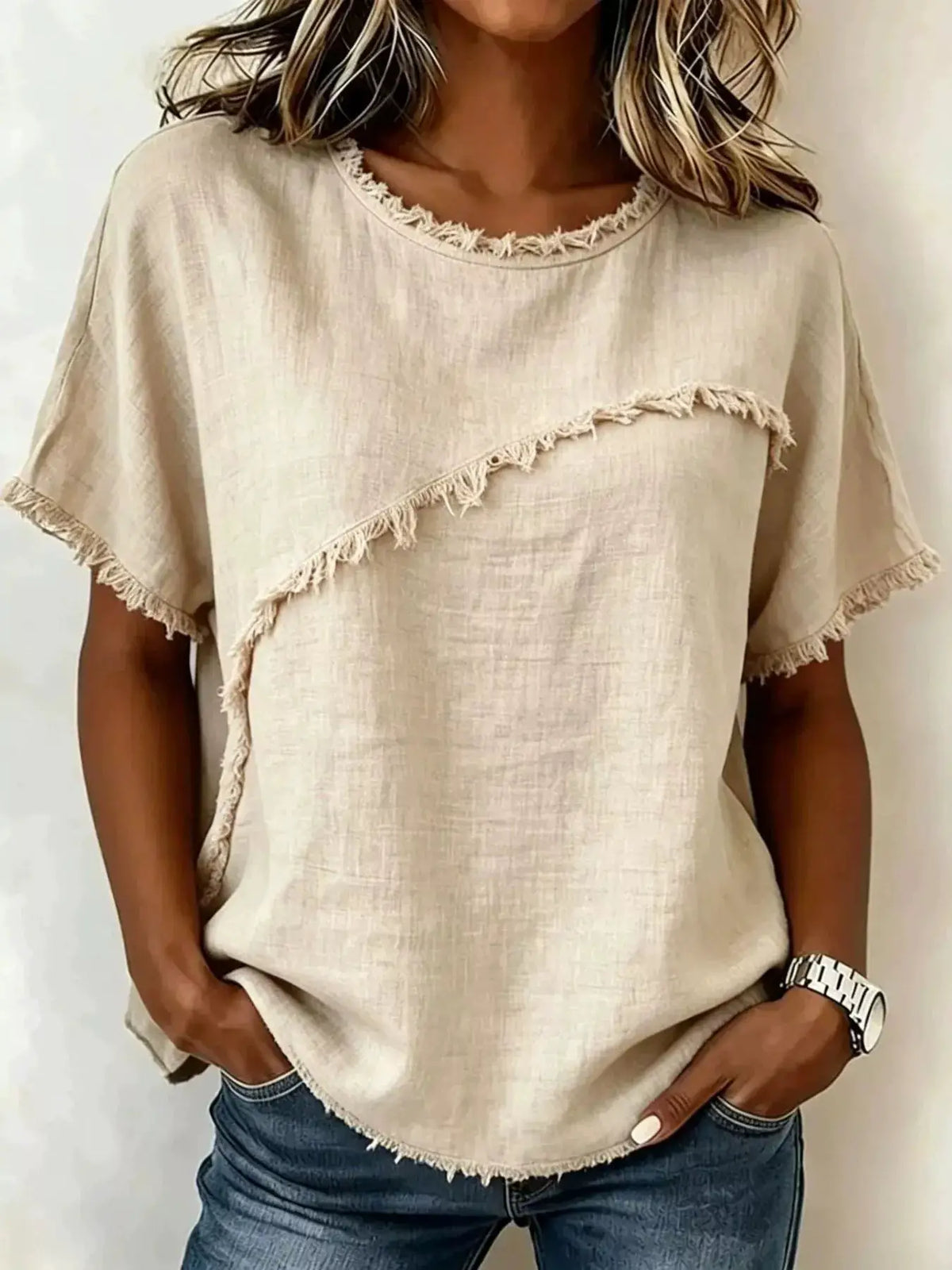 Full Size Frayed Hem Short Sleeve Top Plus Size, beige linen-look fabric with diagonal fringe seam, Trendsi.