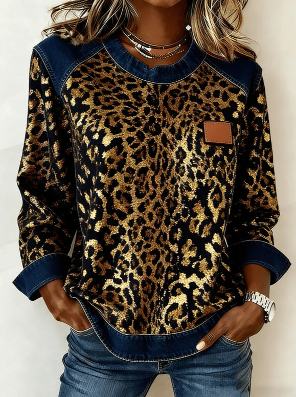 Women's patchwork denim sweatshirt with leopard-print front, dark denim sleeves, brown leather chest patch