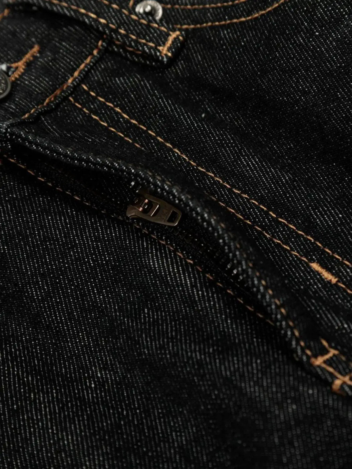 Men's relaxed baggy denim shorts, dark indigo with copper stitching and zipper detail