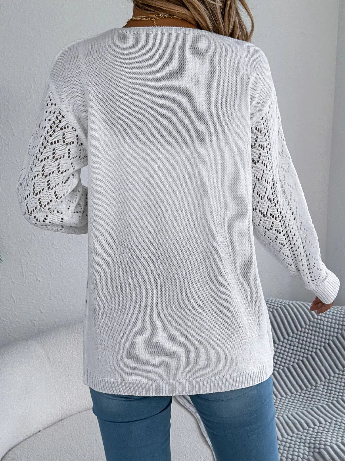 Openwork long-sleeve cardigan in white with lace sleeves, relaxed knit