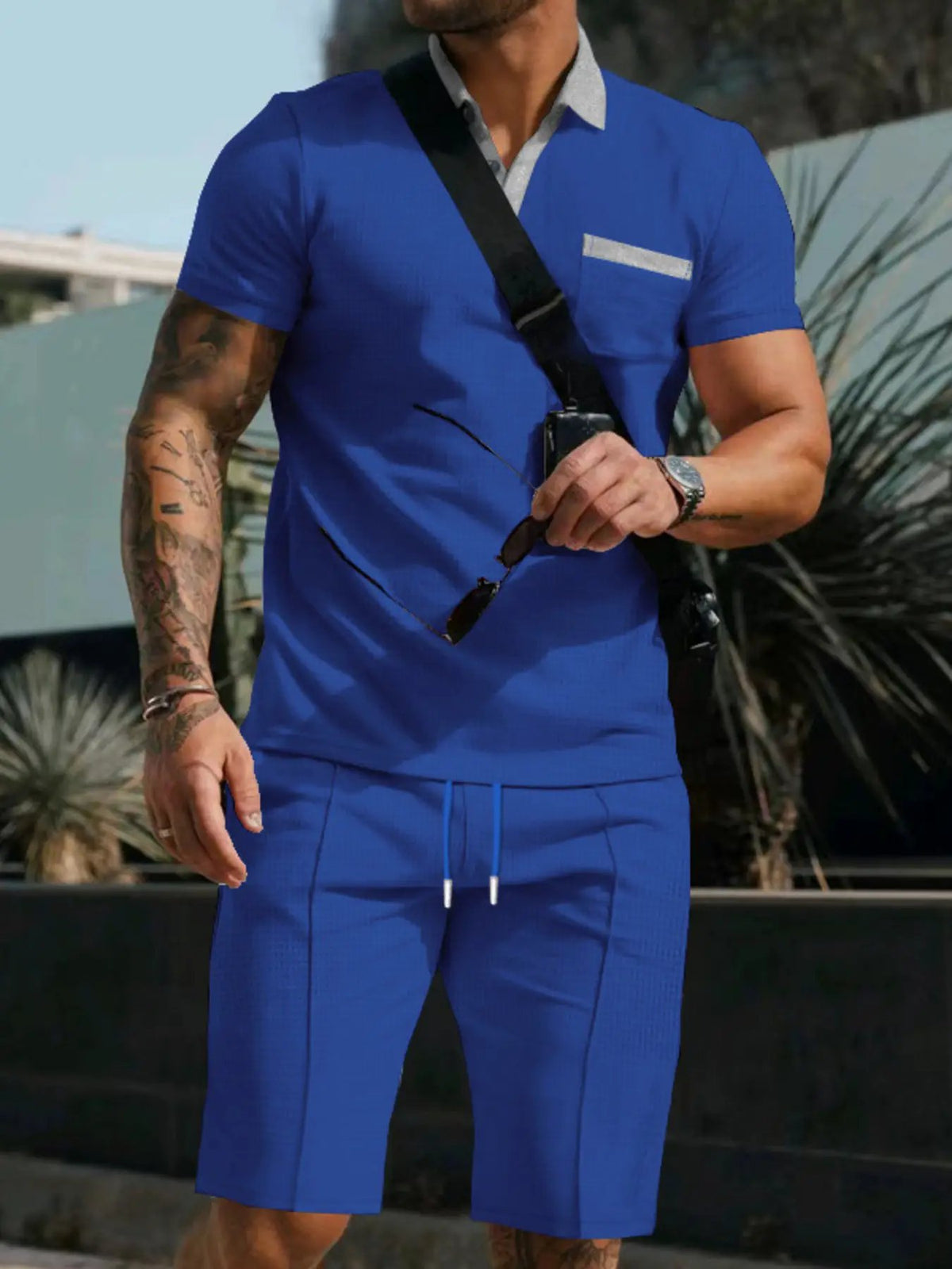 Mens casual short sleeve polo and shorts set in blue with front pockets, stretch fit.