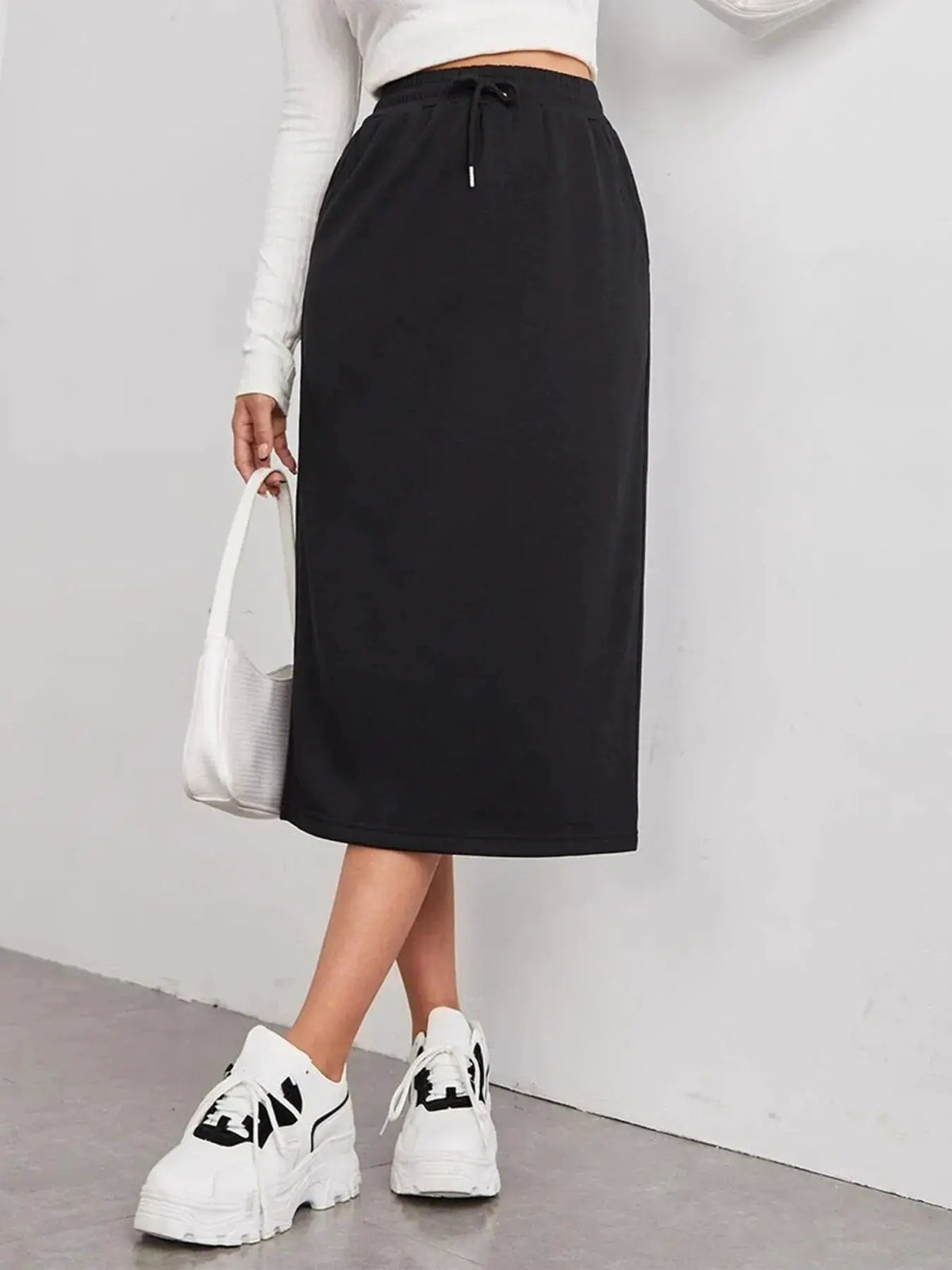 Slit Drawstring Midi Skirt by Trendsi, black midi-length with drawstring waist.