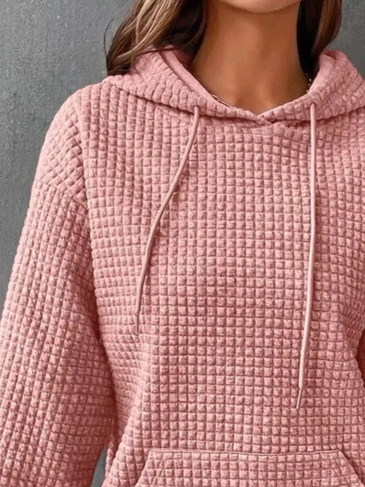 Full Size Textured Kangaroo Pocket Hoodie Plus Size in dusty pink, waffle-knit fabric by Trendsi