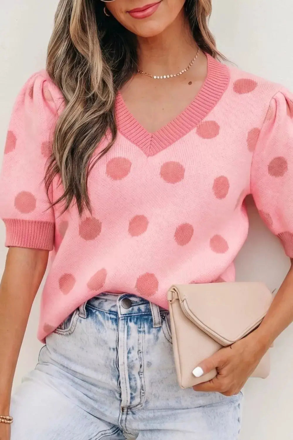 Chic pink polka-dot knit sweater top with puff sleeves and gentle stretch, Trendsi.