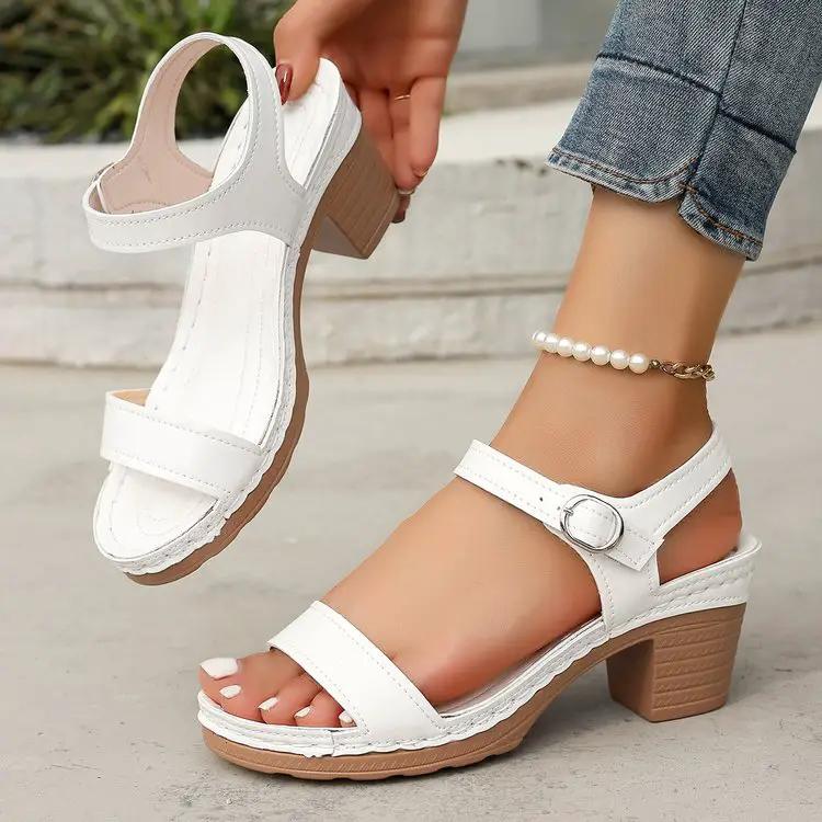 AdTec white open-toe sandals with buckle ankle strap and chunky heel; two sandals shown