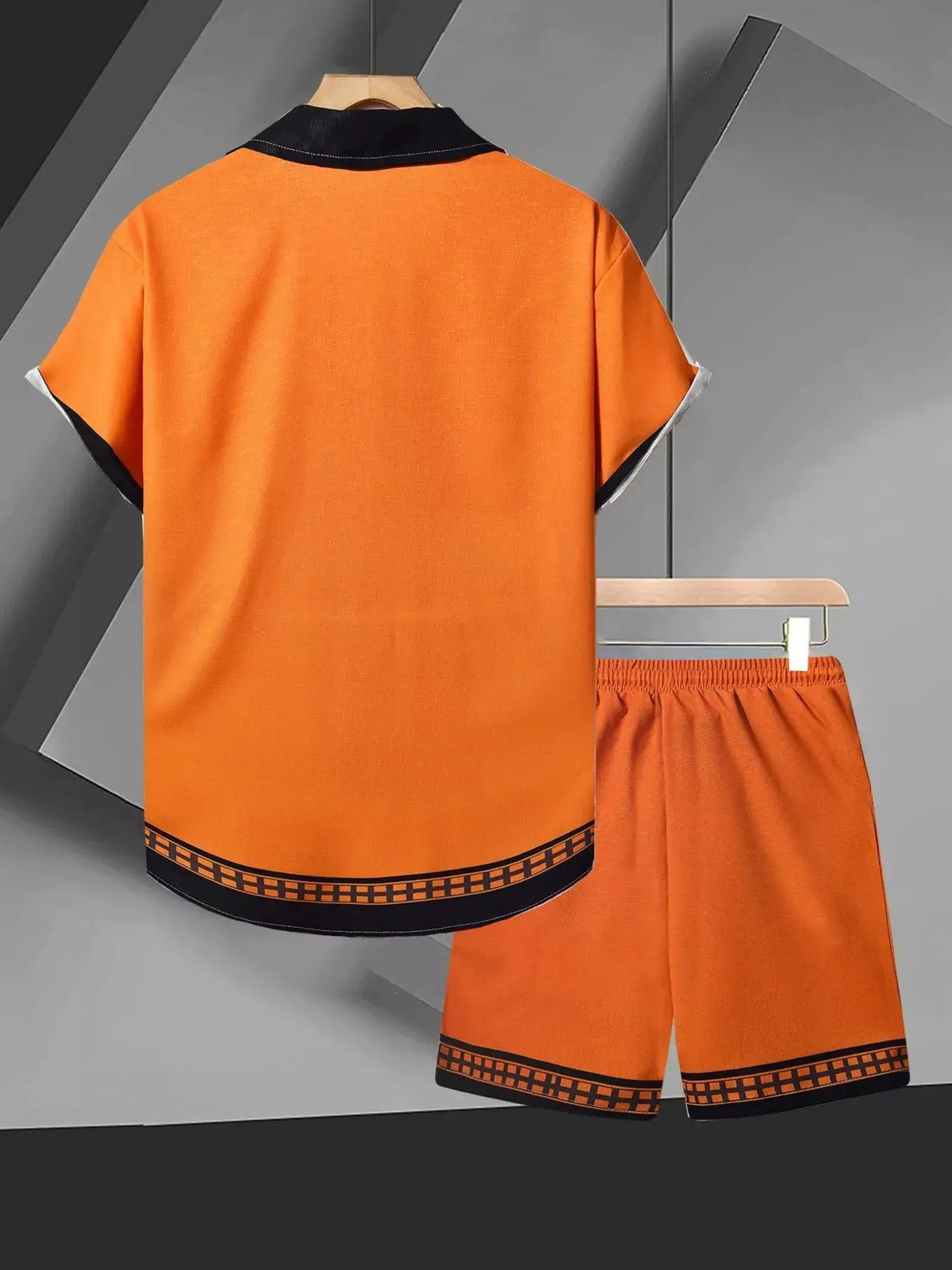 Men's orange short-sleeve shirt and matching shorts set by Trendsi, black collar trim and patterned hem.