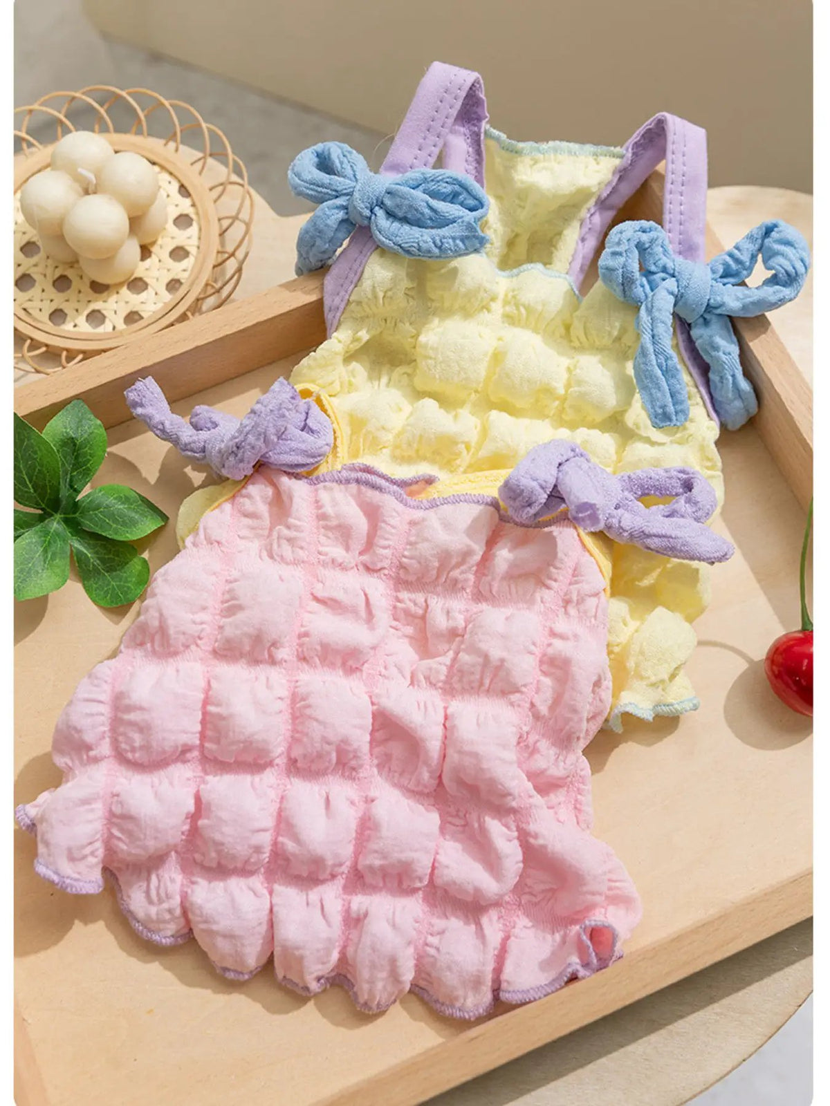 Bubble Textured Tie Shoulder Pet Top in pastel yellow and pink with lavender trim and blue bows (two colorways)