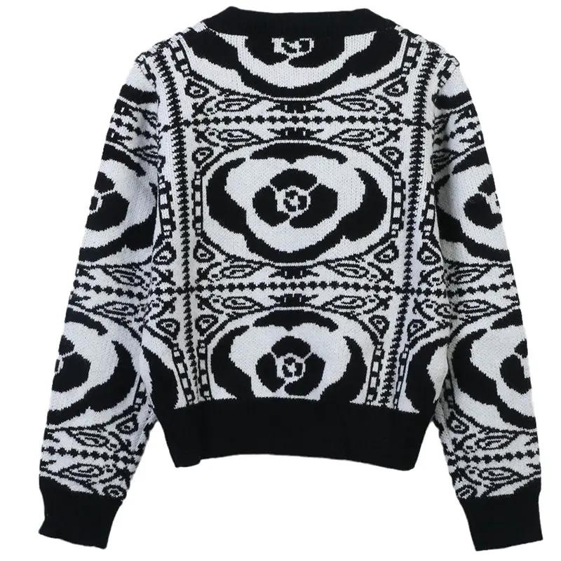 Women’s soft knit pullover sweater in black and white floral pattern, relaxed fit