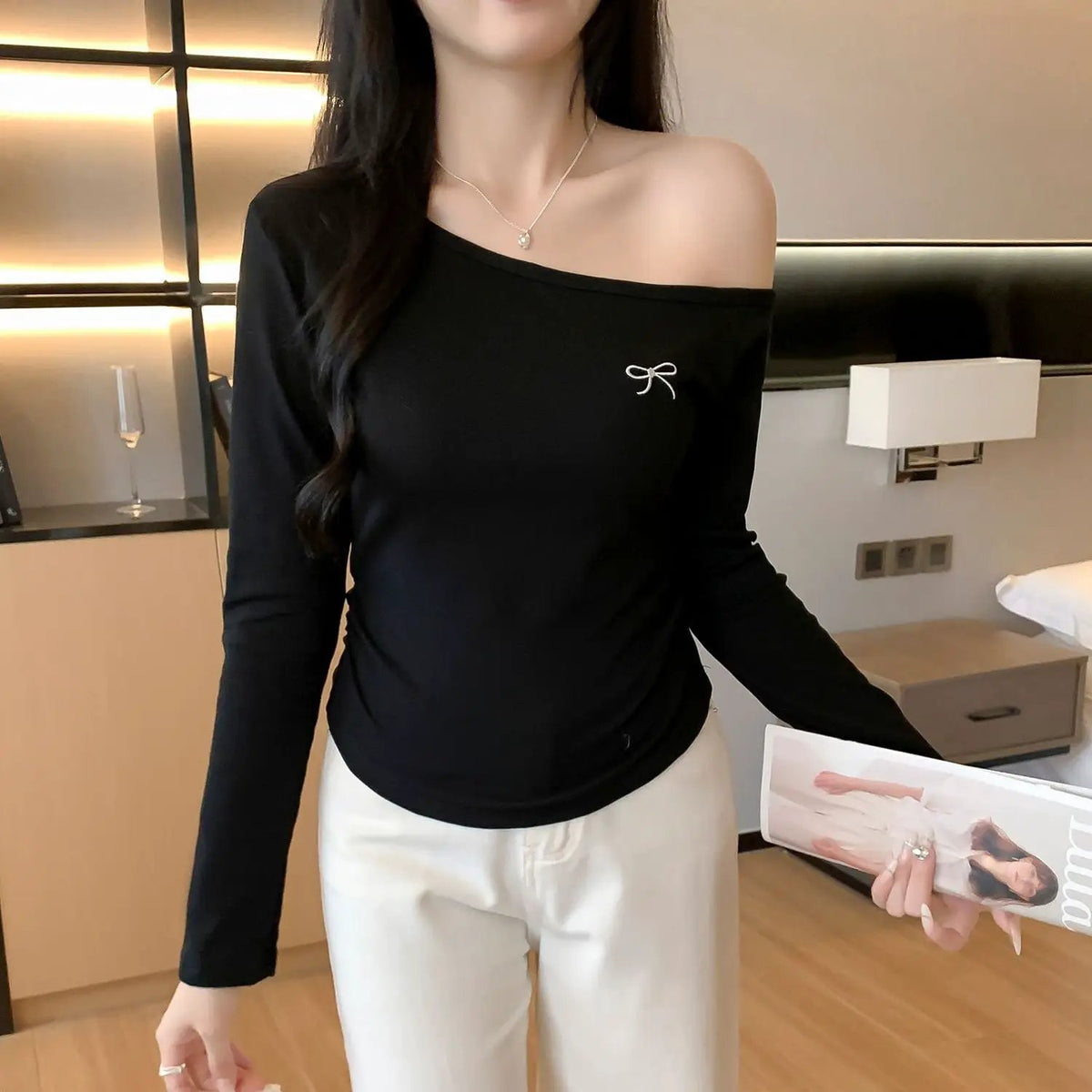 eprolo Black Asymmetric Shoulder Inner T Shirt; black long-sleeve off-shoulder top with bow detail.