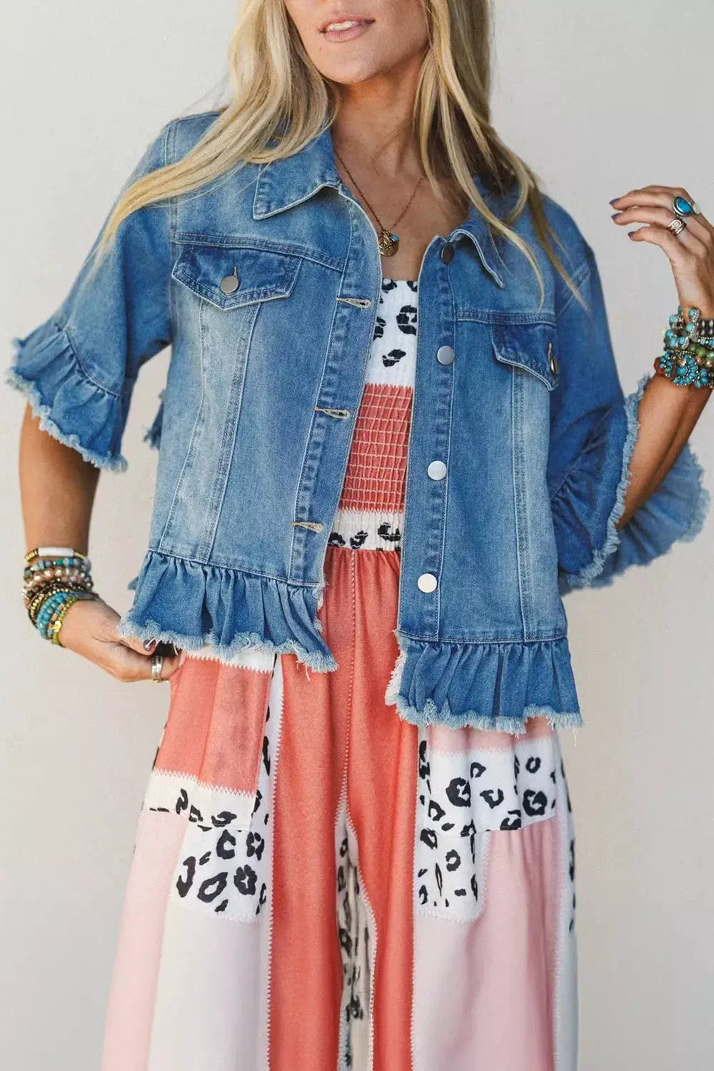 Women's denim jacket with ruffle-hem and raw-edge detail, half sleeves, two-tone blue wash