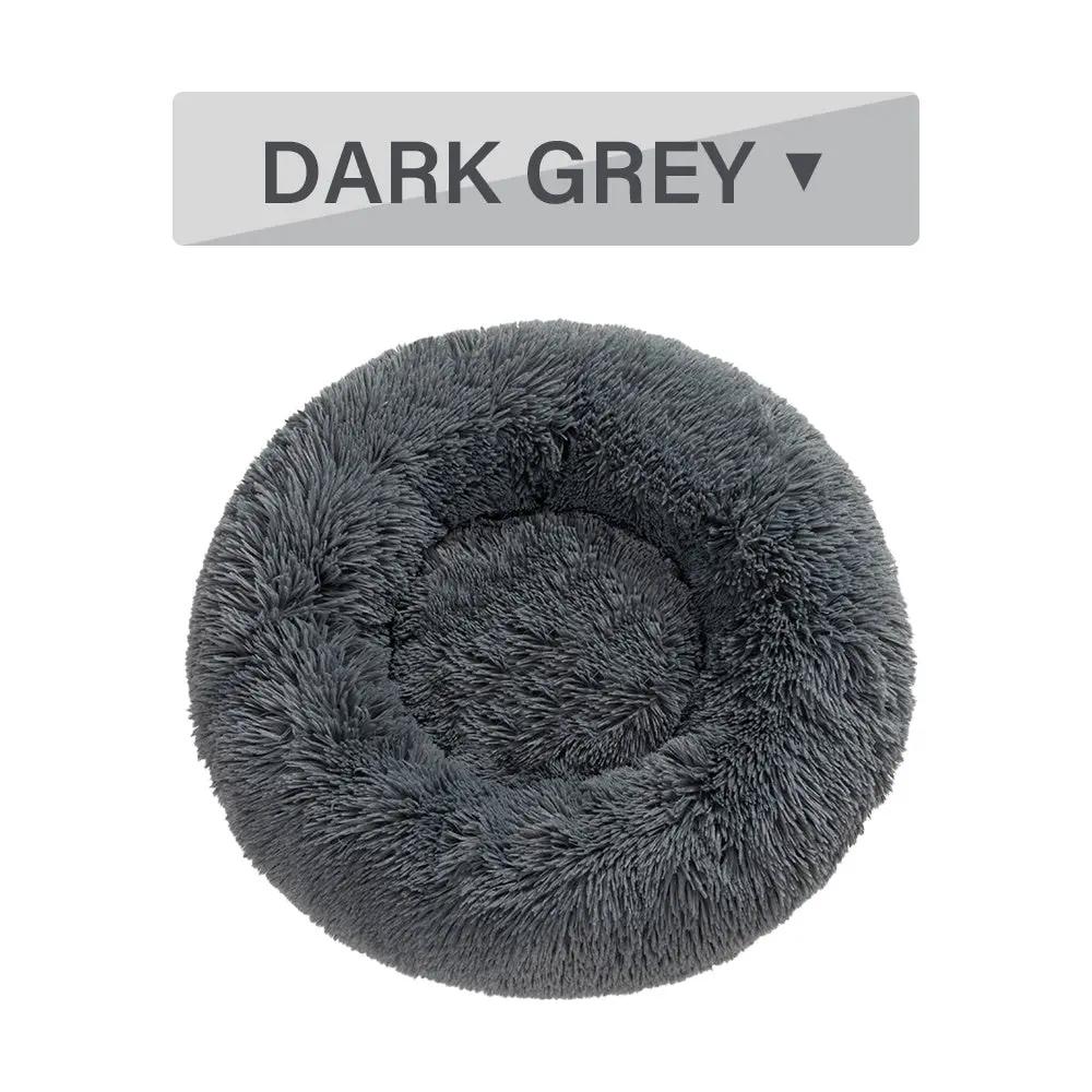 Fluffy donut dog bed in dark grey plush; warm, washable pet cushion.