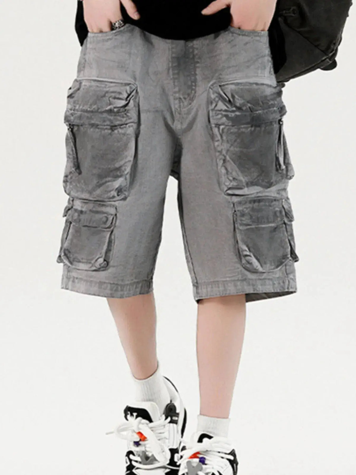Men's wide-leg cargo denim shorts with stretch cotton in gray and multiple pockets.