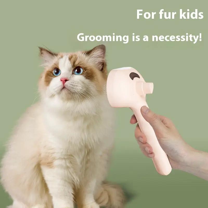 Pink pet spray hair comb grooming tool shown beside a fluffy cat during grooming