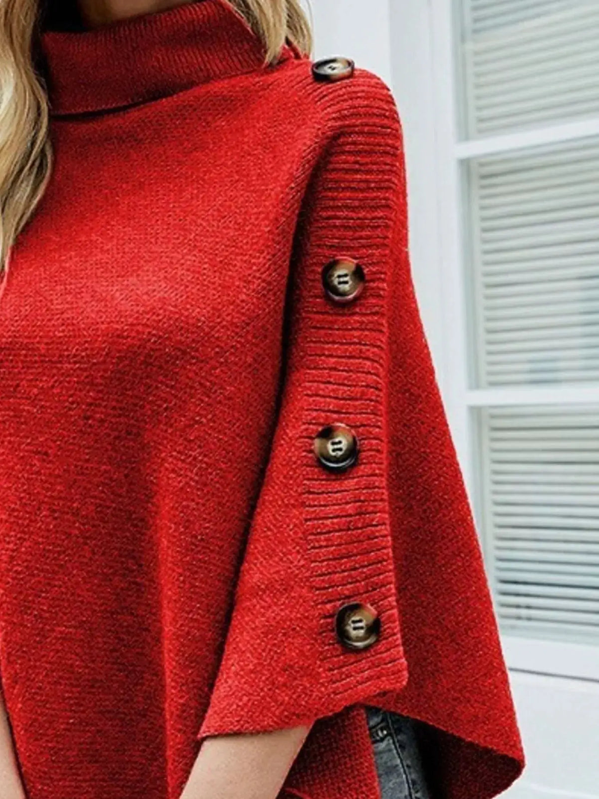 Button Turtleneck Poncho Pullover in red knit with buttoned sleeve accents