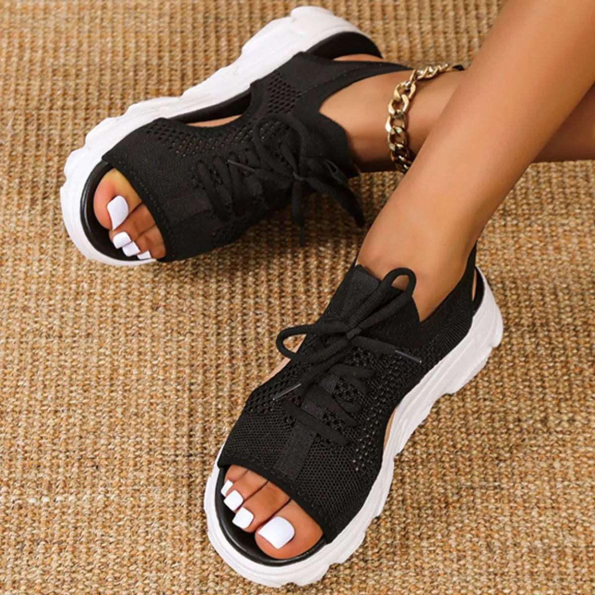 Breathable mesh lace-up platform sandals, black with white chunky soles.