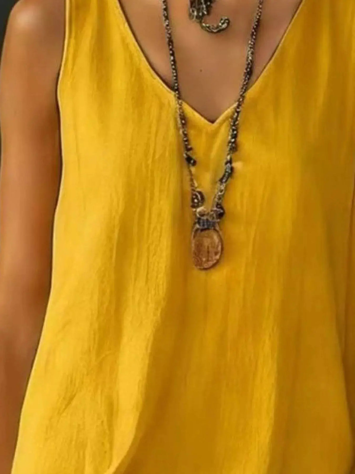 Dress yellow plus-size sleeveless V-neck with a ruffled hem