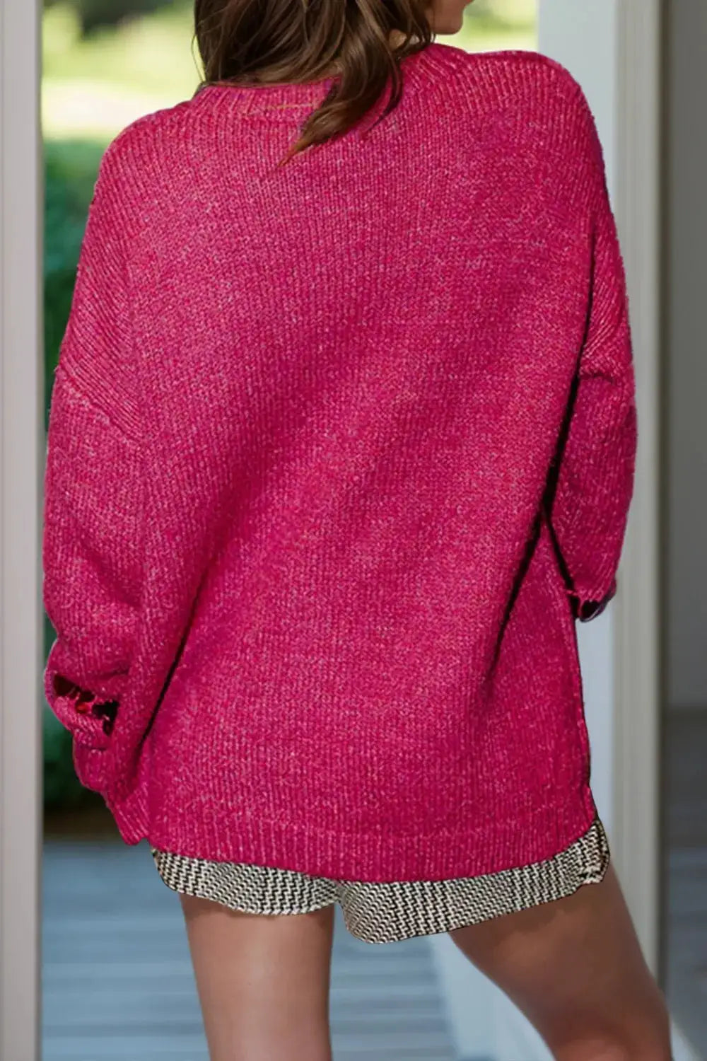 Long-sleeve pink oversized knit sweater with textured fabric by Trendsi