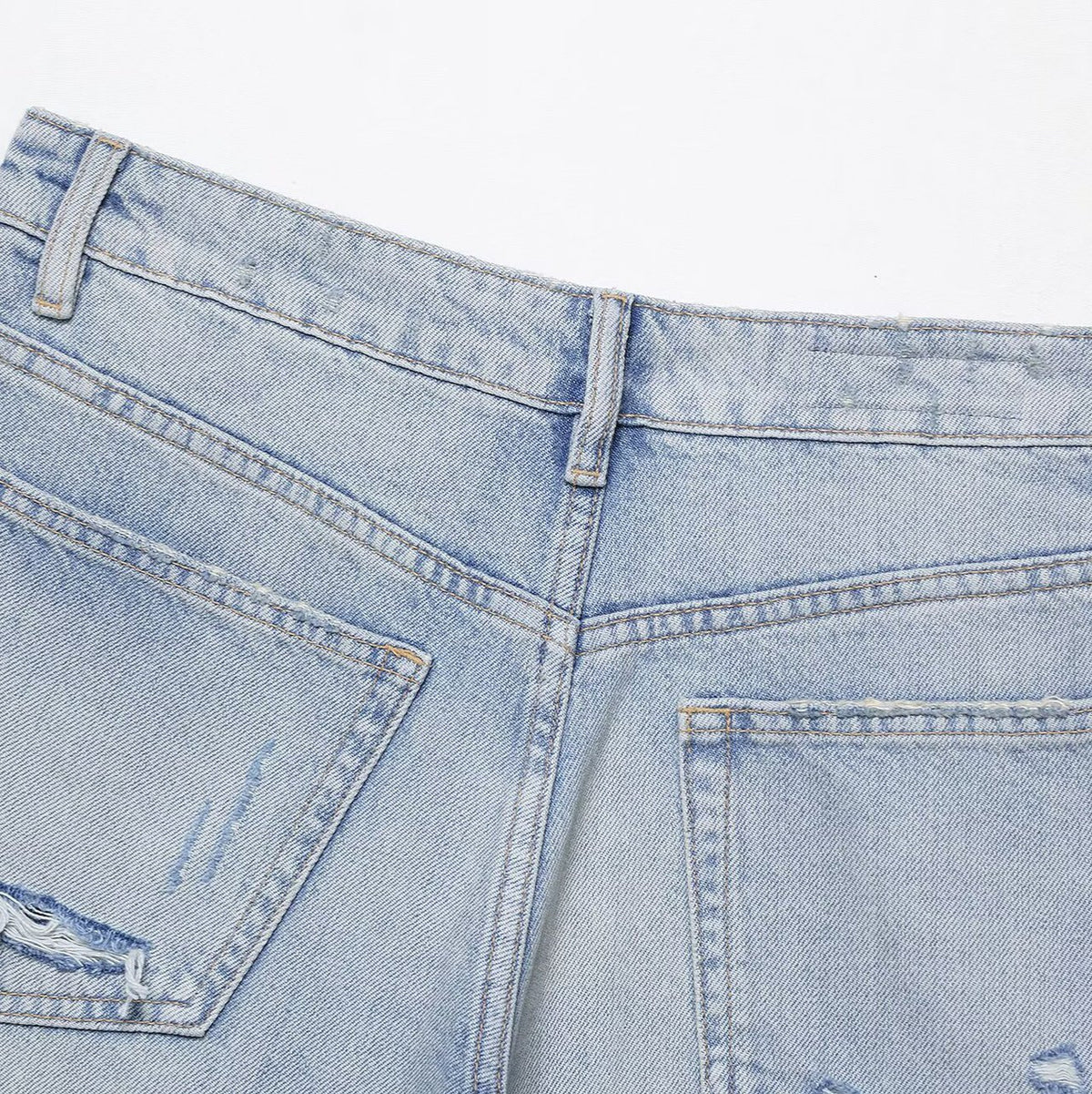 Loose denim casual shorts, light blue denim with belt loops and back pockets.