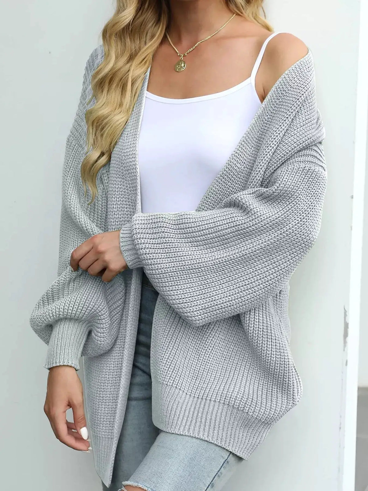 Cozy oversized chunky knit open-front cardigan with lantern sleeves in light gray