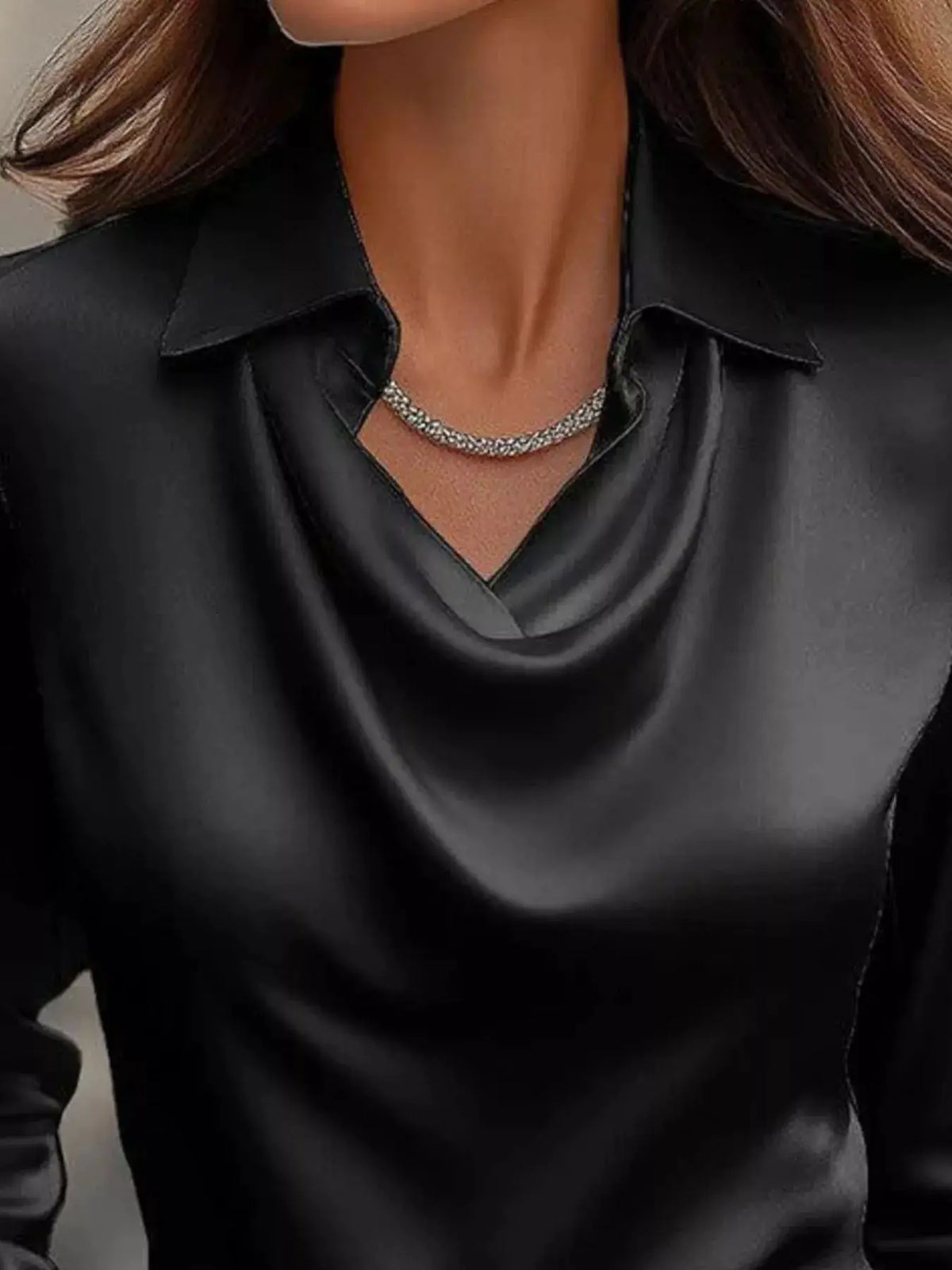Plus-size satin cowl-neck long-sleeve blouse in black by Trendsi