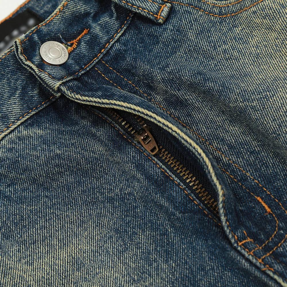 Color blocked yellow mud dyed washed denim jeans by eprolo