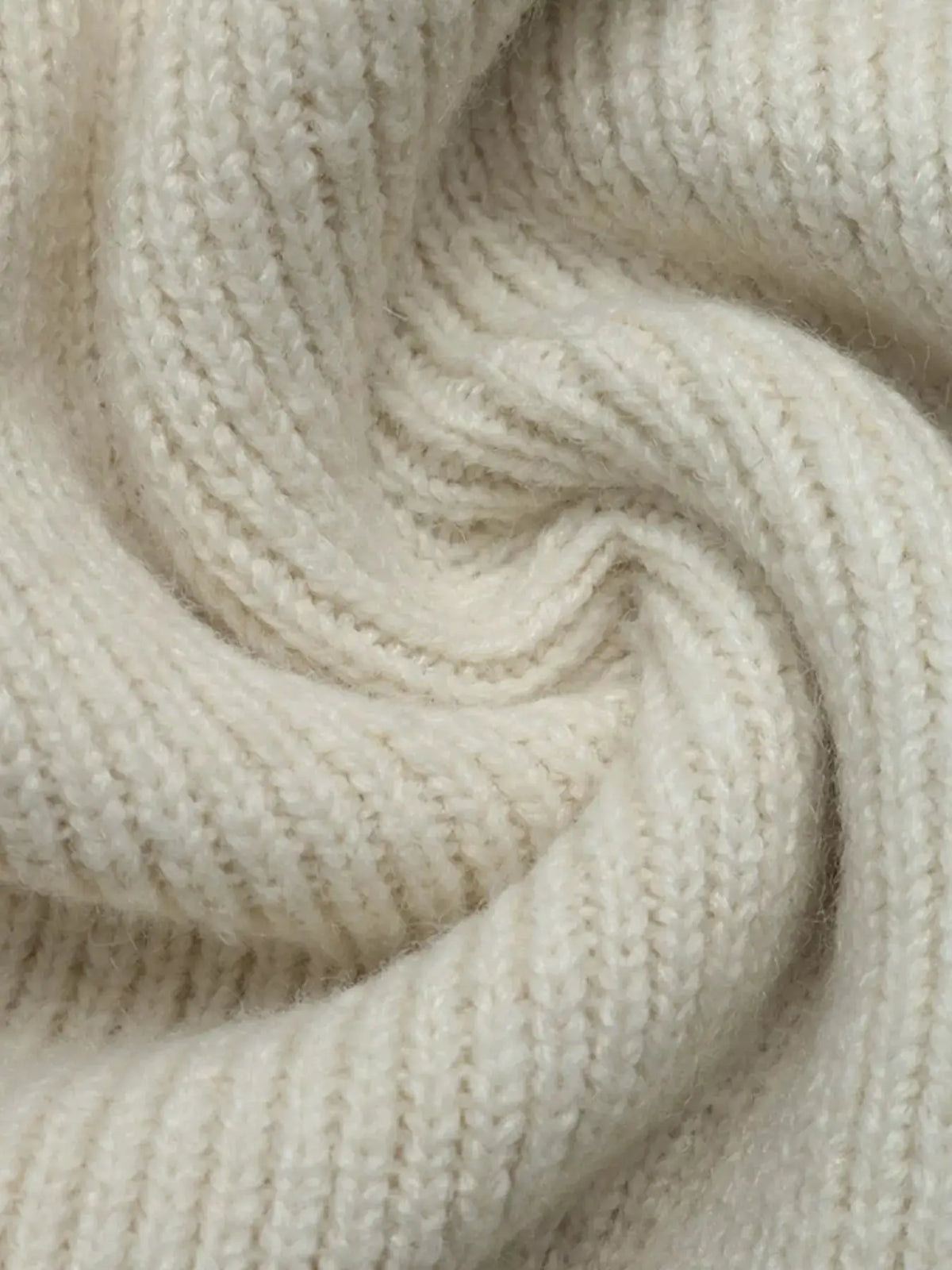 Four-Leaf Clover Open Front Cardigan in cream chunky knit fabric.