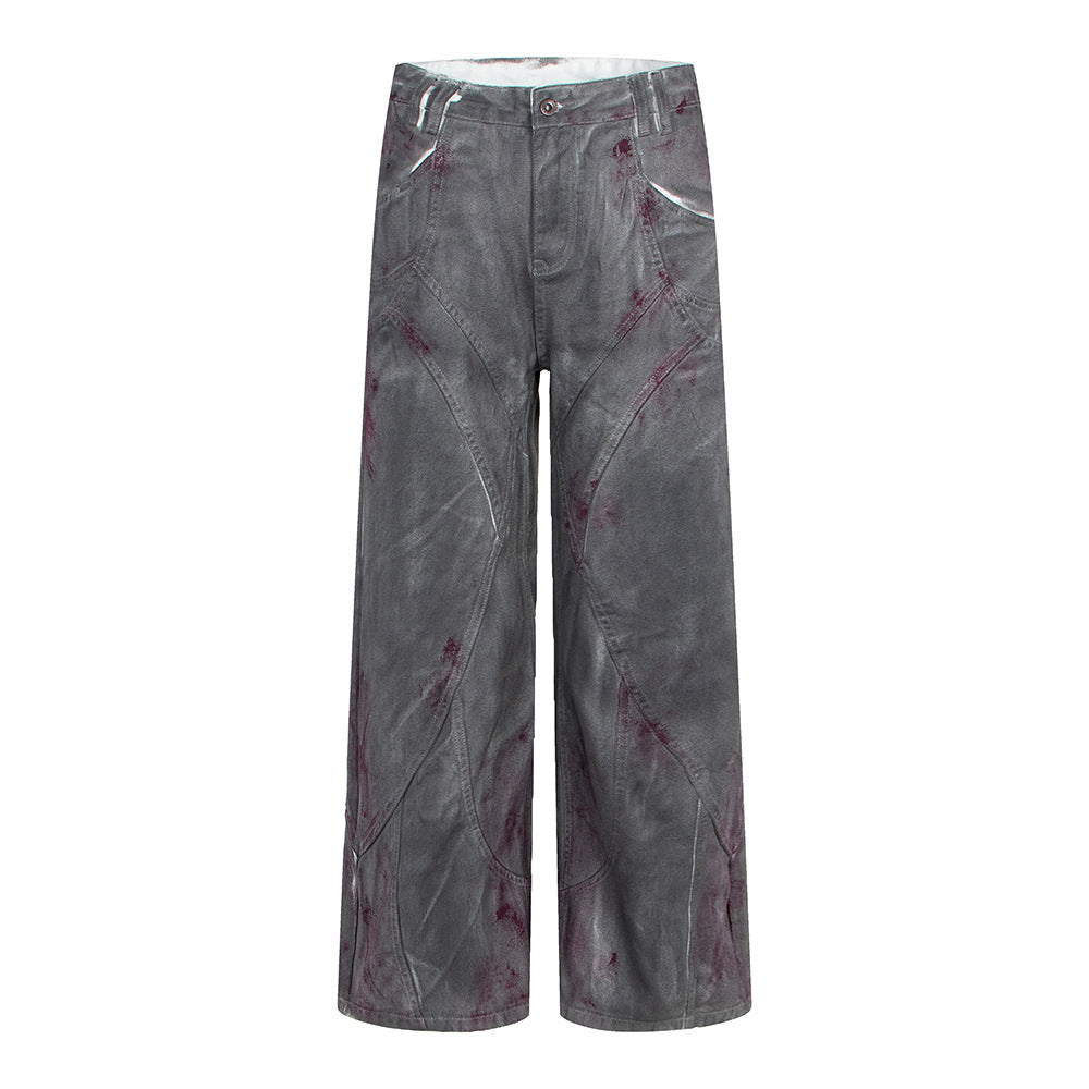 Distressed dyed denim jeans by eprolo, gray wide-leg style with purple stains.