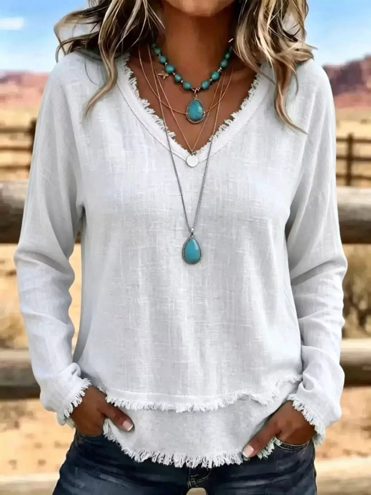 V-Neck Frayed-Hem Long Sleeve T-Shirt, white fabric with turquoise layered necklaces