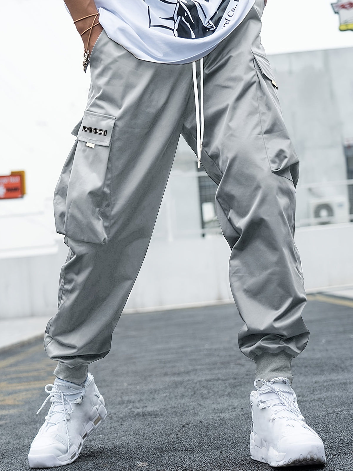 Cargo pants, grey multi-pocket with drawstring waist and Air Borne patch