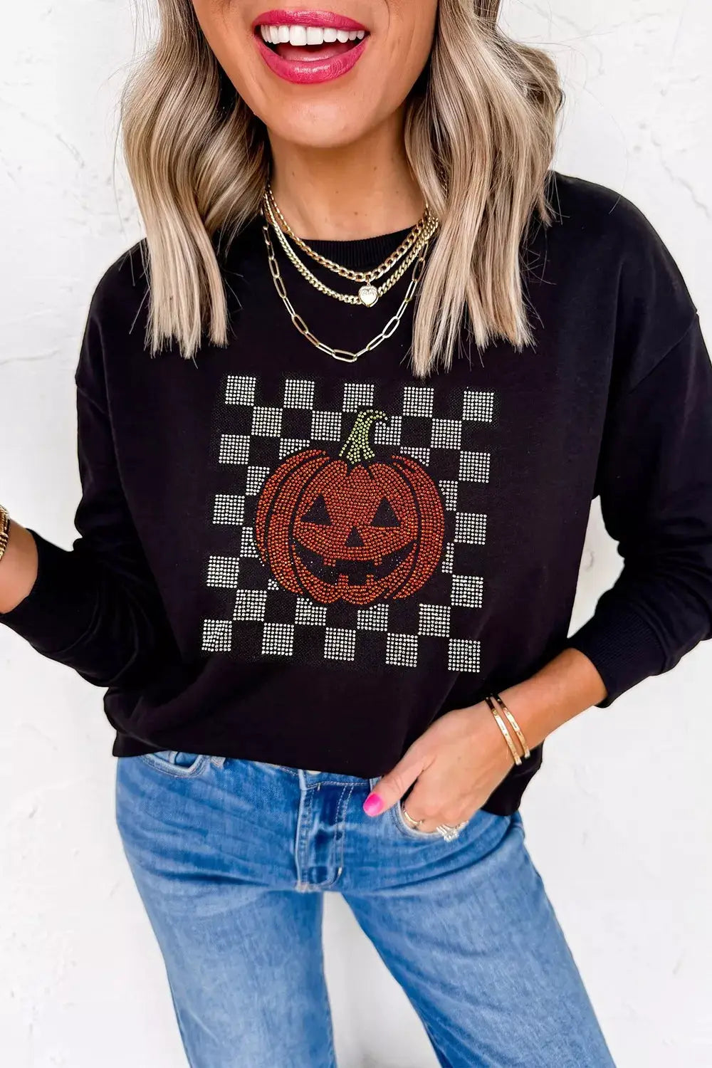 Rhinestone Pumpkin Long Sleeve Sweatshirt in black with orange rhinestone pumpkin motif