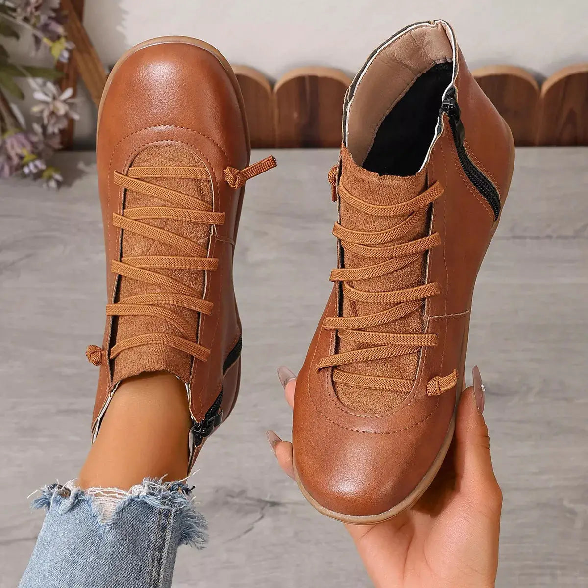Lace-Up faux leather ankle boots, brown with matching laces and side zipper, pair shown