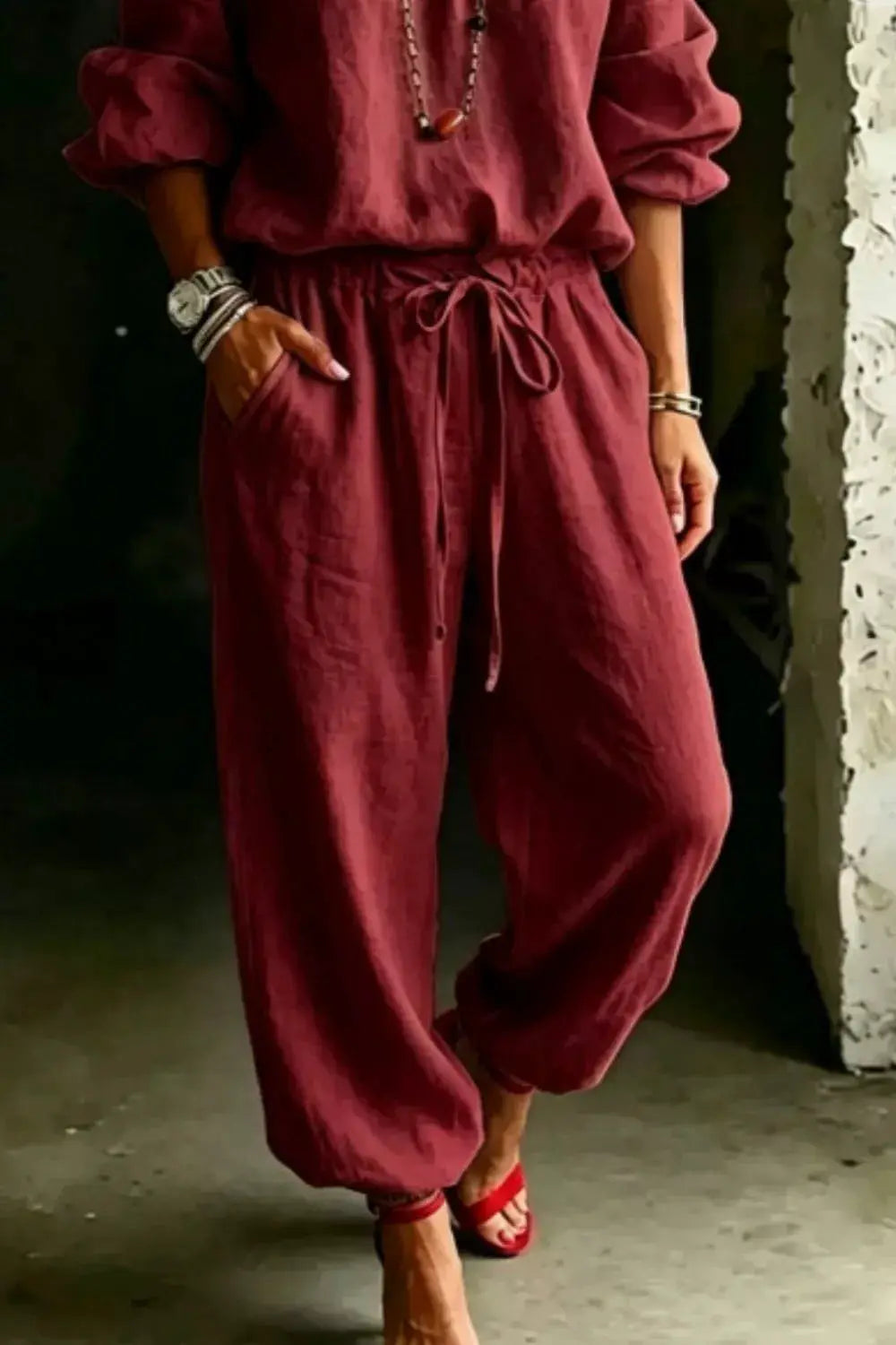 Full-size off-shoulder top and pants set in burgundy, plus-size, by Trendsi