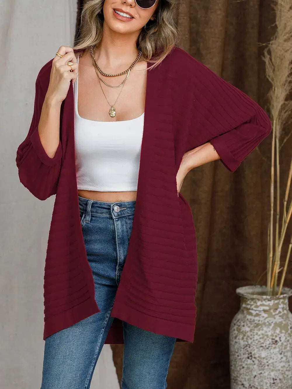 Striped open-front burgundy acrylic cardigan with a relaxed, stretchy fit for layering
