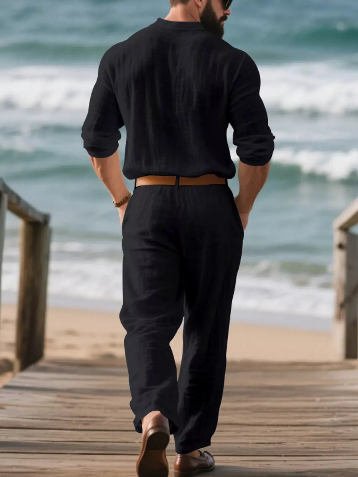Mens Plus Size Linen Top and Pants Set in black; man walking on beach boardwalk
