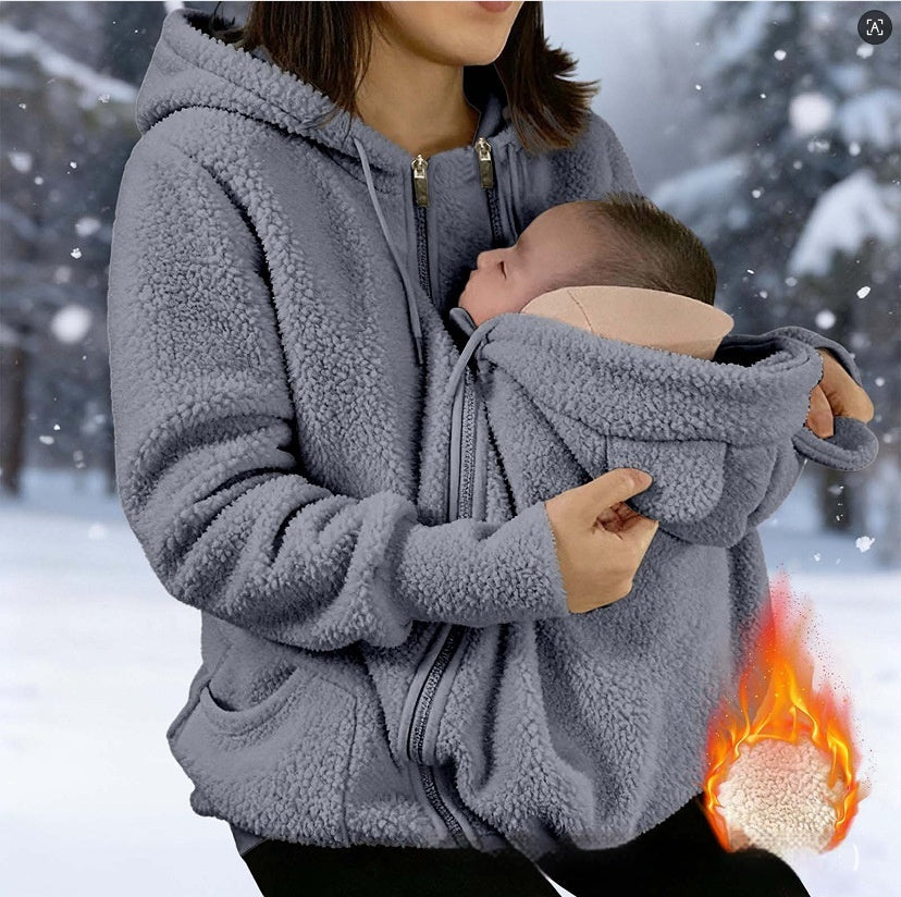 Corduroy Hooded Sweatshirt nursing hoodie in gray, mom cradling a baby outdoors in a snowy scene.