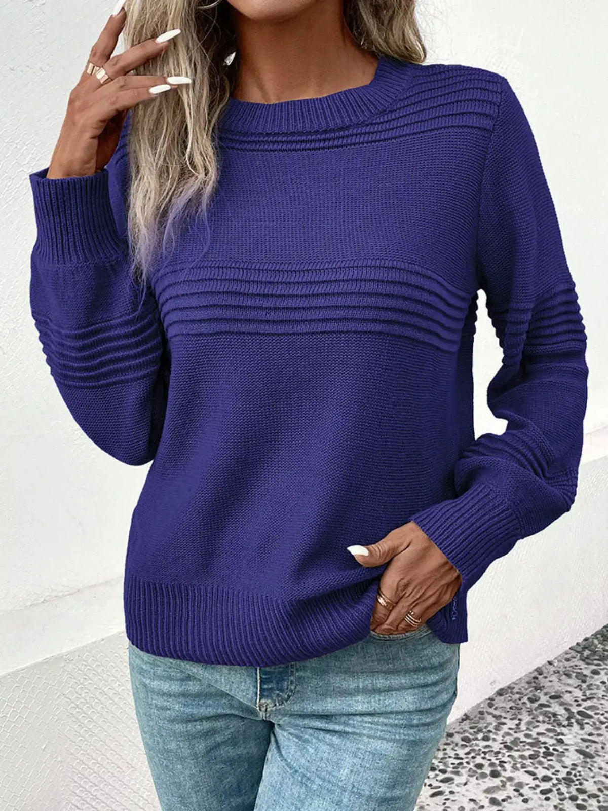 Cozy acrylic round-neck long-sleeve sweater in royal blue with ribbed yoke and stretch fit.