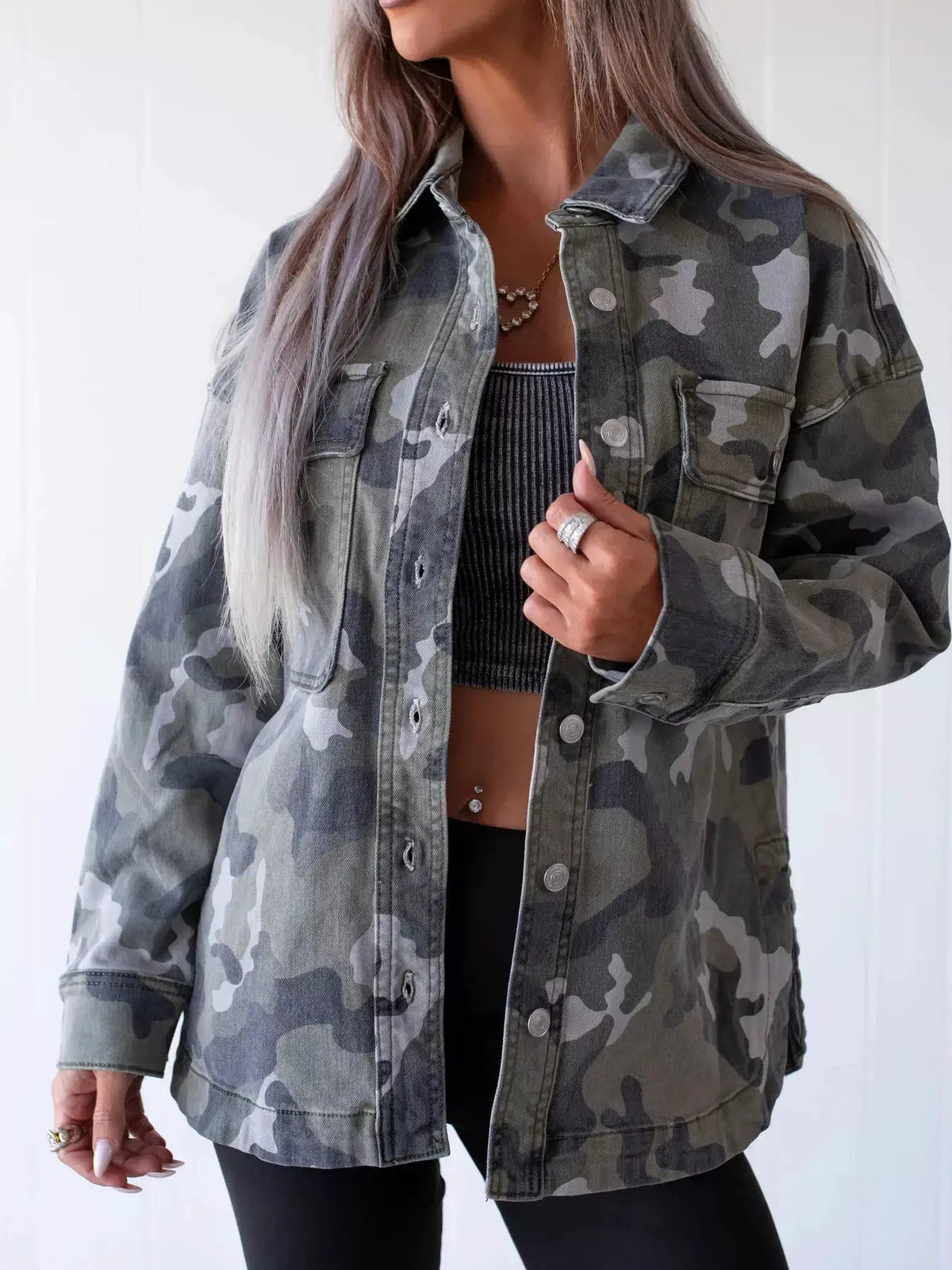 Camouflage-pattern denim jacket by Trendsi with button front and utility chest pockets