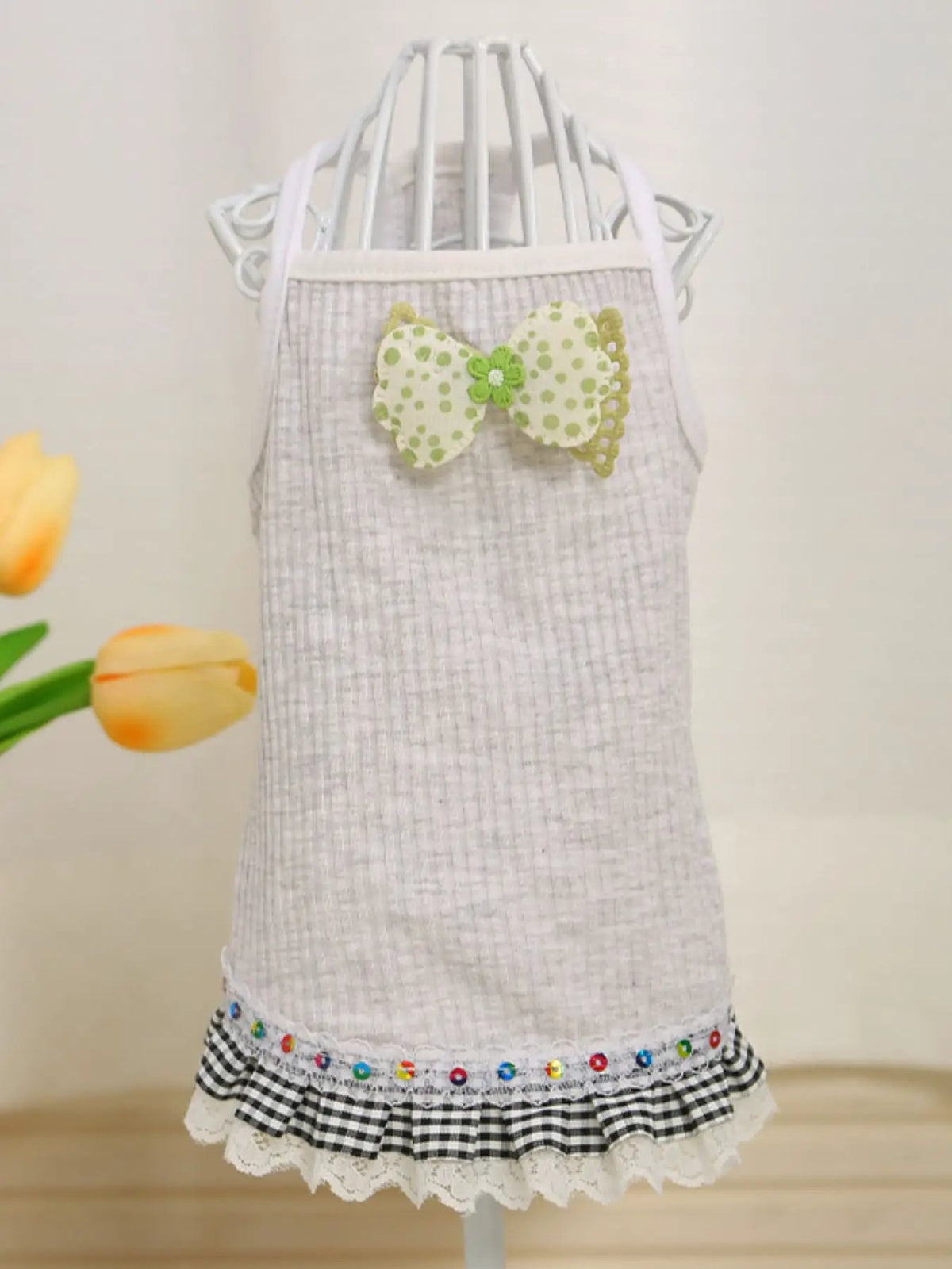 Bowknot Ruffled Hem Pet Top in light gray knit with a green polka-dotted bow and lace trim