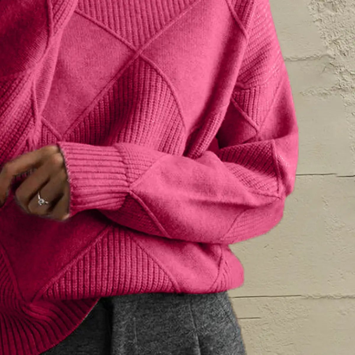 Geometric pink long-sleeve knit sweater; diamond pattern, ribbed cuffs, basic stretch knit
