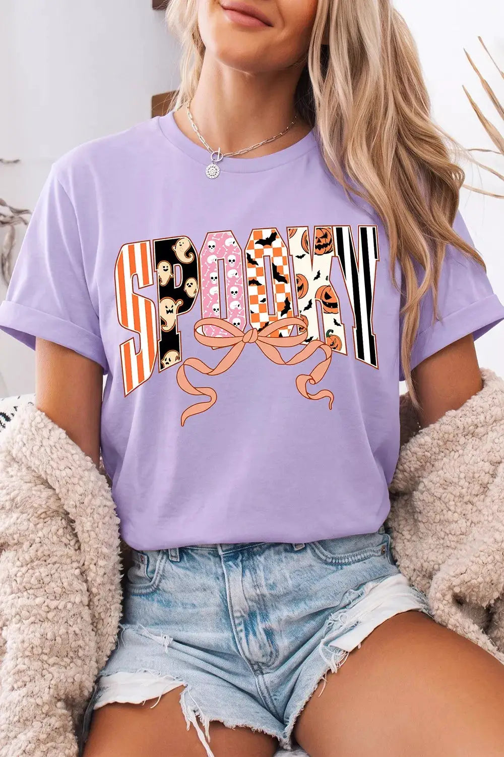 Halloween Spooky Letter Graphic Round-Neck T-shirt in lavender with a pink bow across the patterned letters, Trendsi.