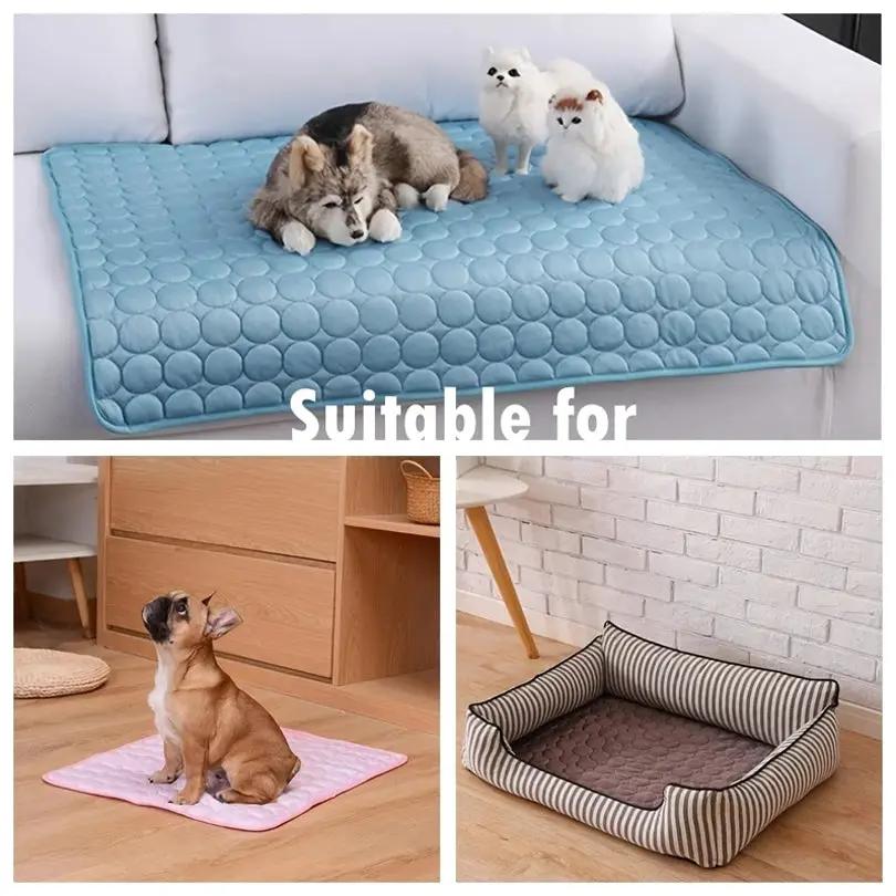 AdTec dog cooling mat and three pet beds: blue mat on couch, pink mat, and striped dog bed.