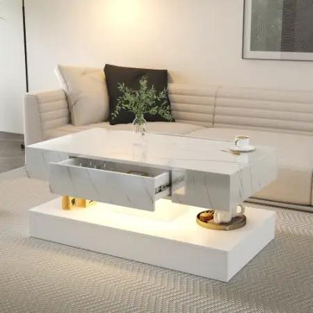 6.93IN High LED Coffee Table, white marble finish with built-in drawer and under-shelf lighting in a modern living room.