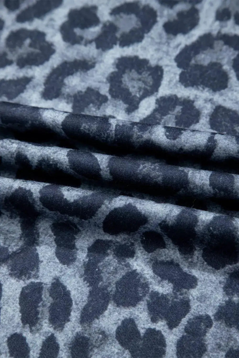 Leopard print frilled-detail drawstring wide-leg pants in blue-gray fabric.